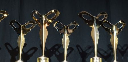 Trophées des SILMO d'Or, combinaison entre une silhouette aillée et une paire de lunettes