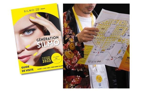 Visiteur consultant le plan de SILMO Paris